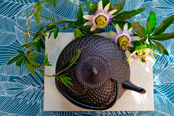Passionflower and an iron teapot