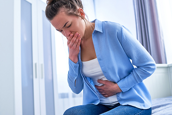 Woman feeling nauseous